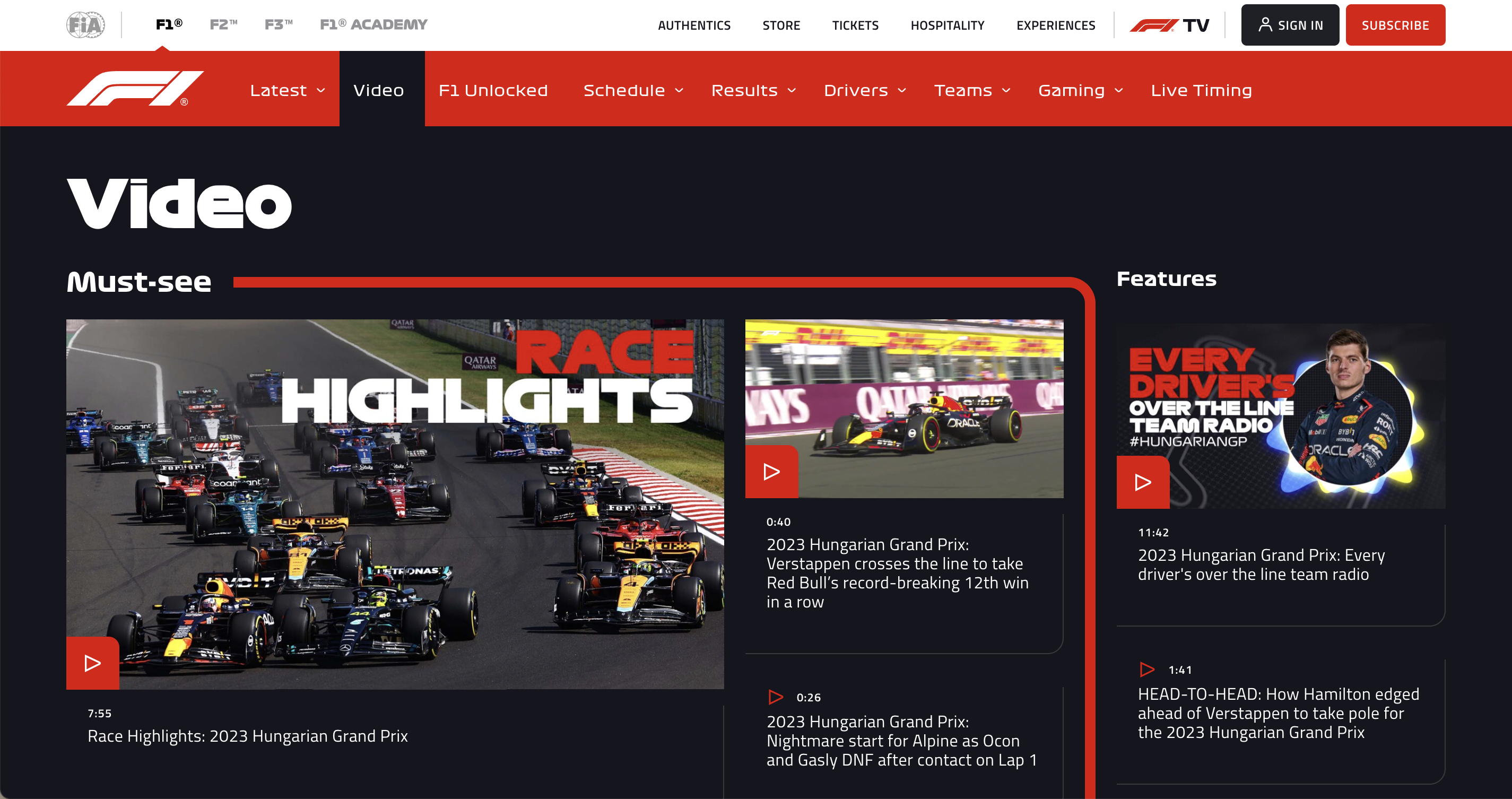 Screenshot from the F1 motorsport website showing their VIDEOS page which shows various video tiles and titles.